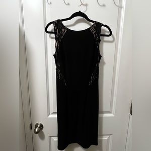 Sheek and comfortable black midi dress! Made from great material, double lined.